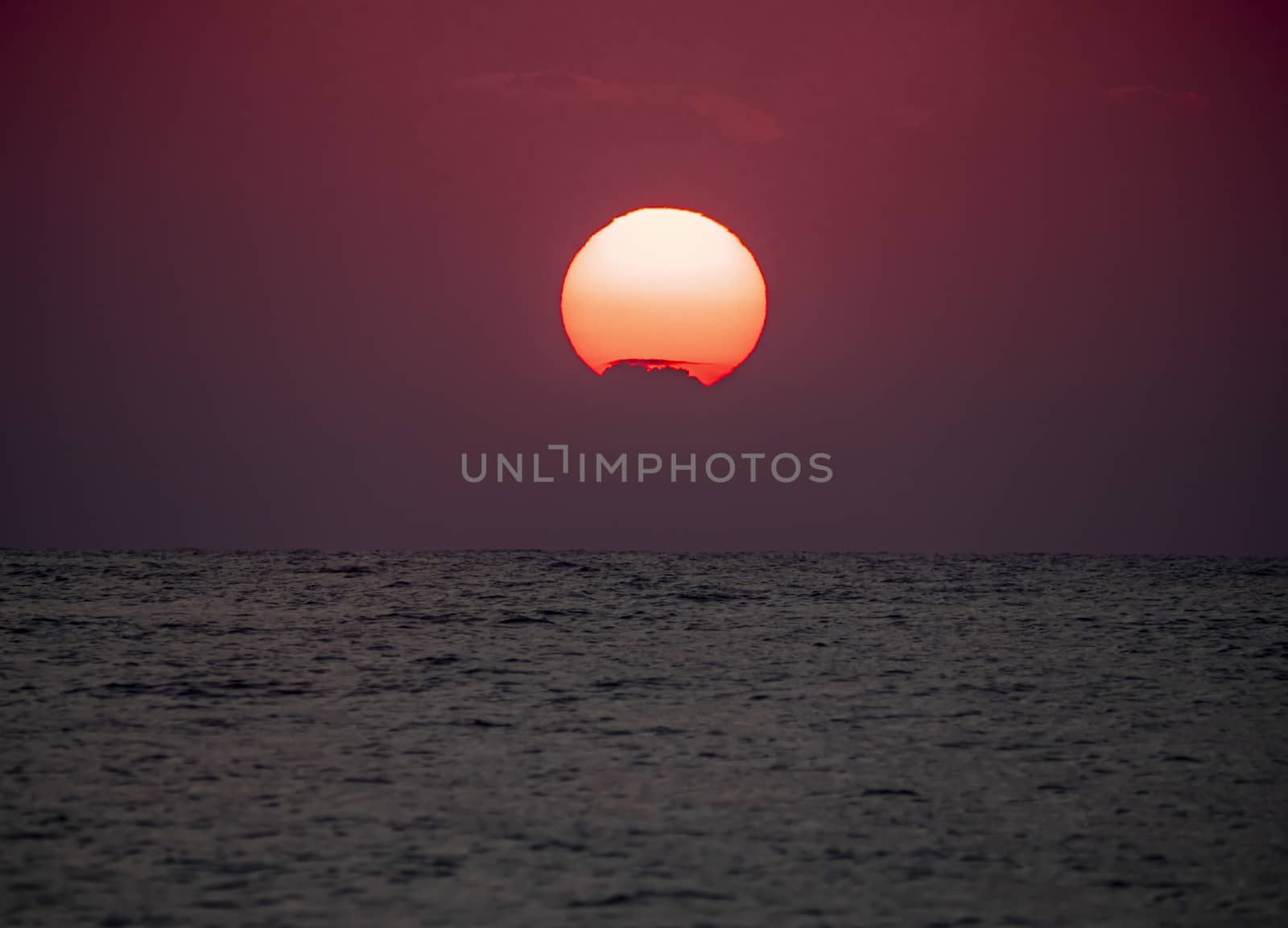 big sun down over sea sunrise, red sky