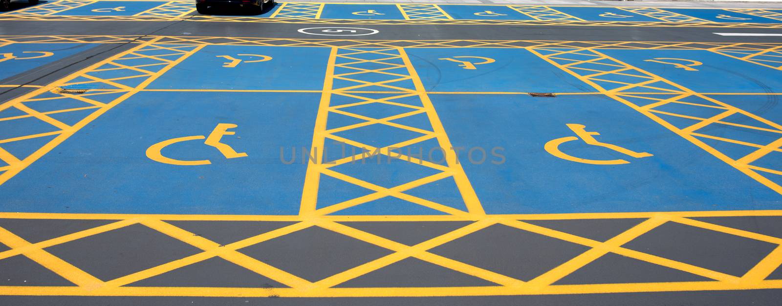 The disabled parking yellow and blue sign by Iryna_Melnyk