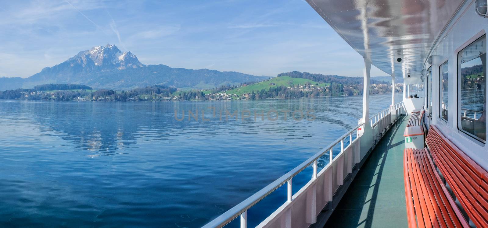 The outside deck of a ferry on lake Lucerne
 by Surasak