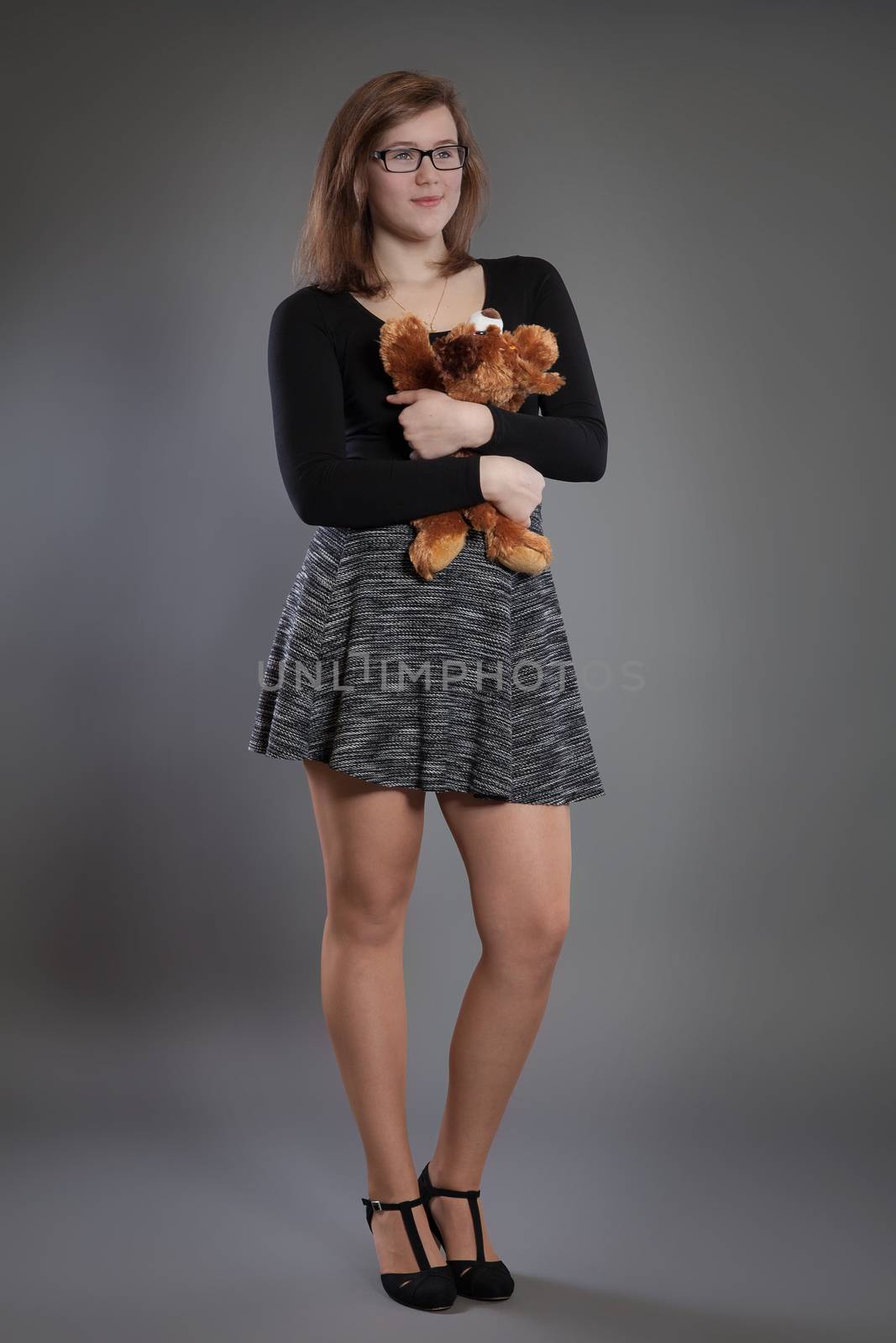 Young woman with a soft toy by 25ehaag6