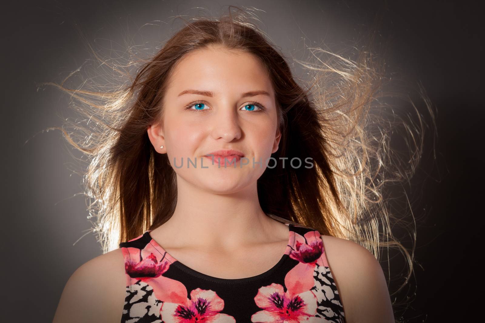 Young woman with flying hair