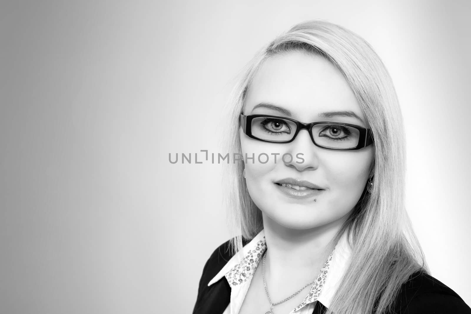 Young blonde business woman, portrait