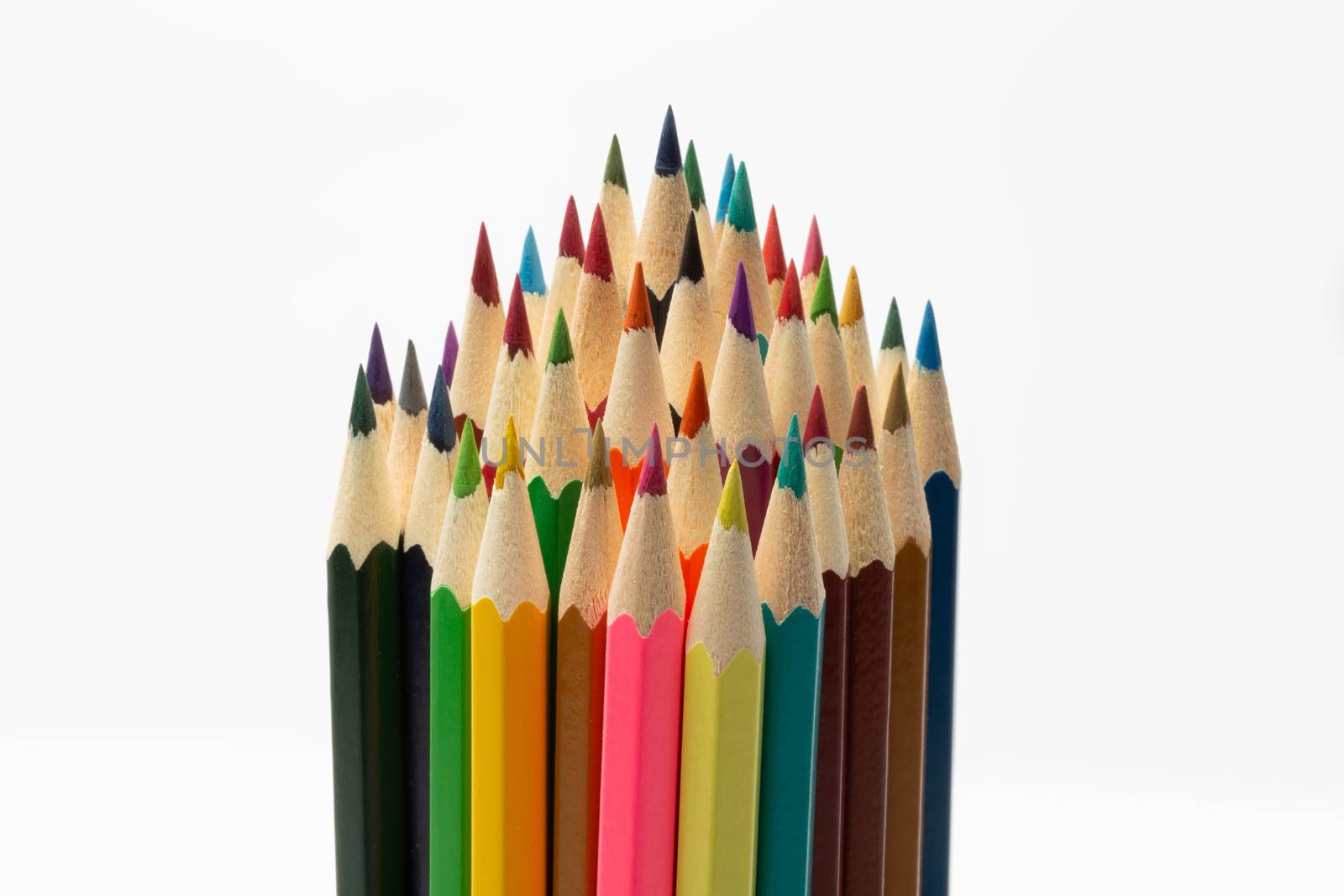Some colorful wooden pencils on a white background