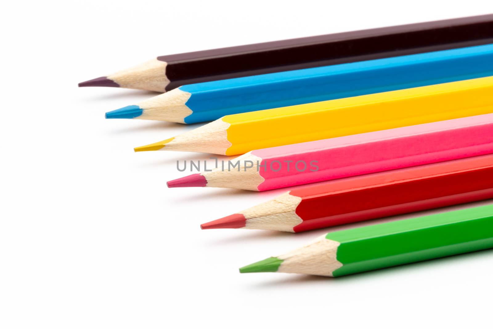 A Colorful color wooden pencils on a white background