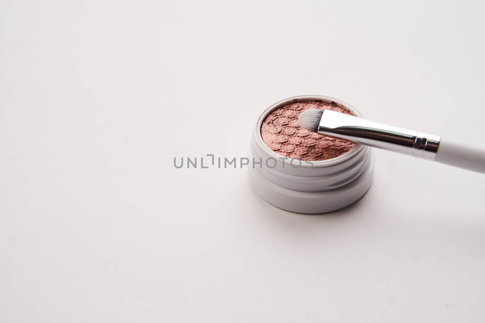 professional eyeshadow on isolated background and makeup brushes cosmetics fashion by SHOTPRIME