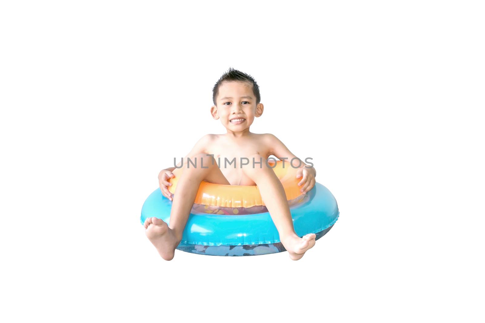 Cute Asian boy sitting on the colorful swim rings isolated on white background.