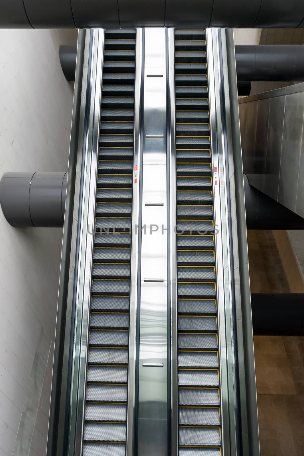 Closeup of the escalator in the big building.