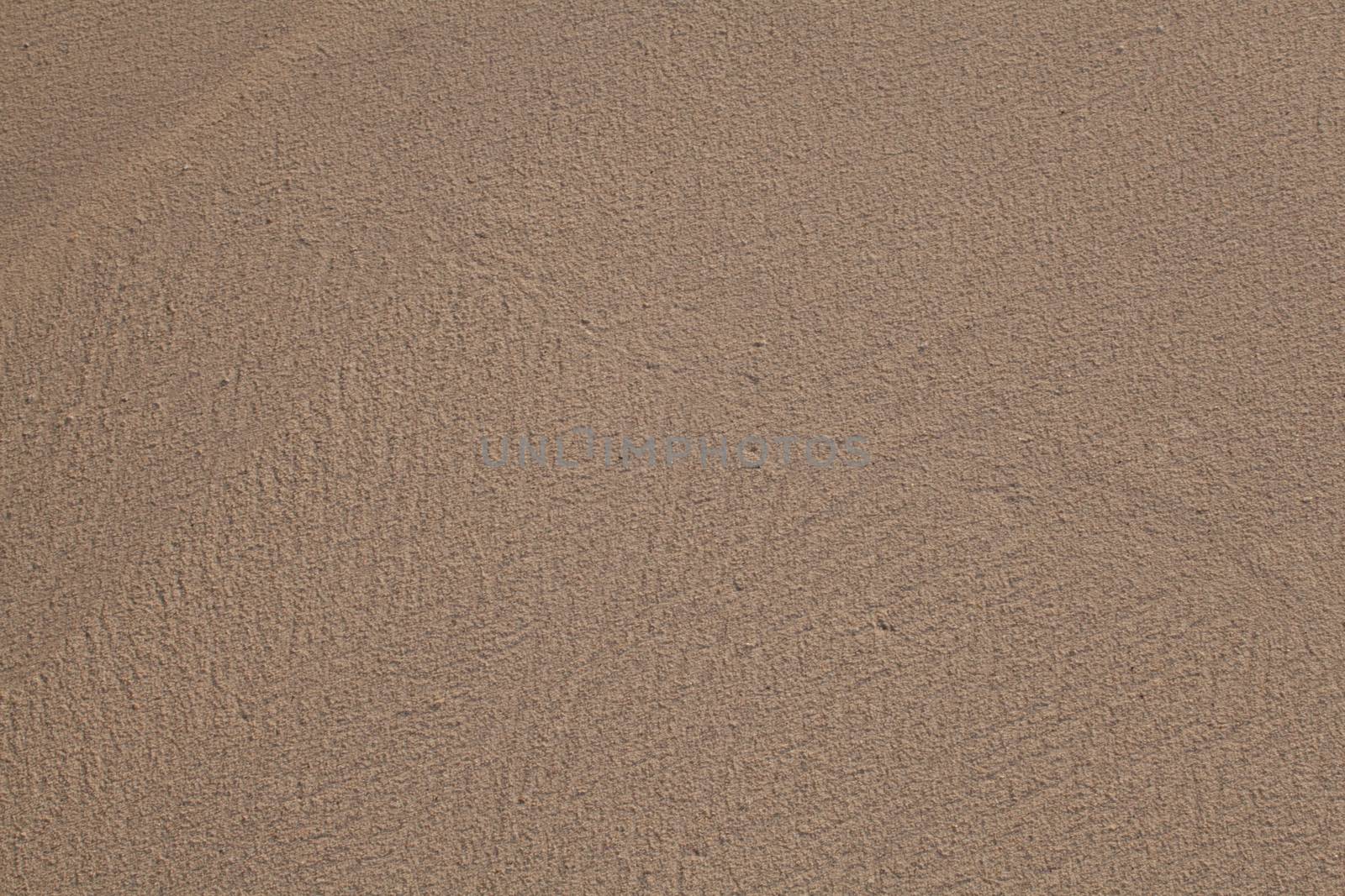 Texture of sand as background from the beach
