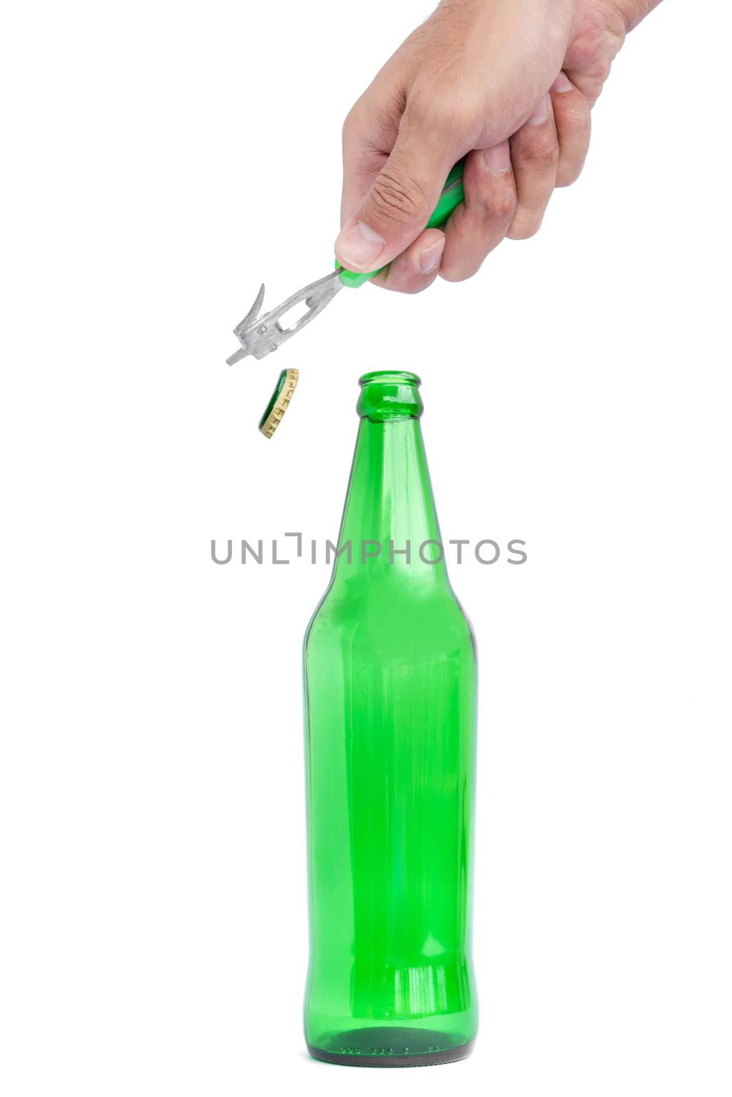 Hands are opening a beer bottle with a device for opening the bottle.