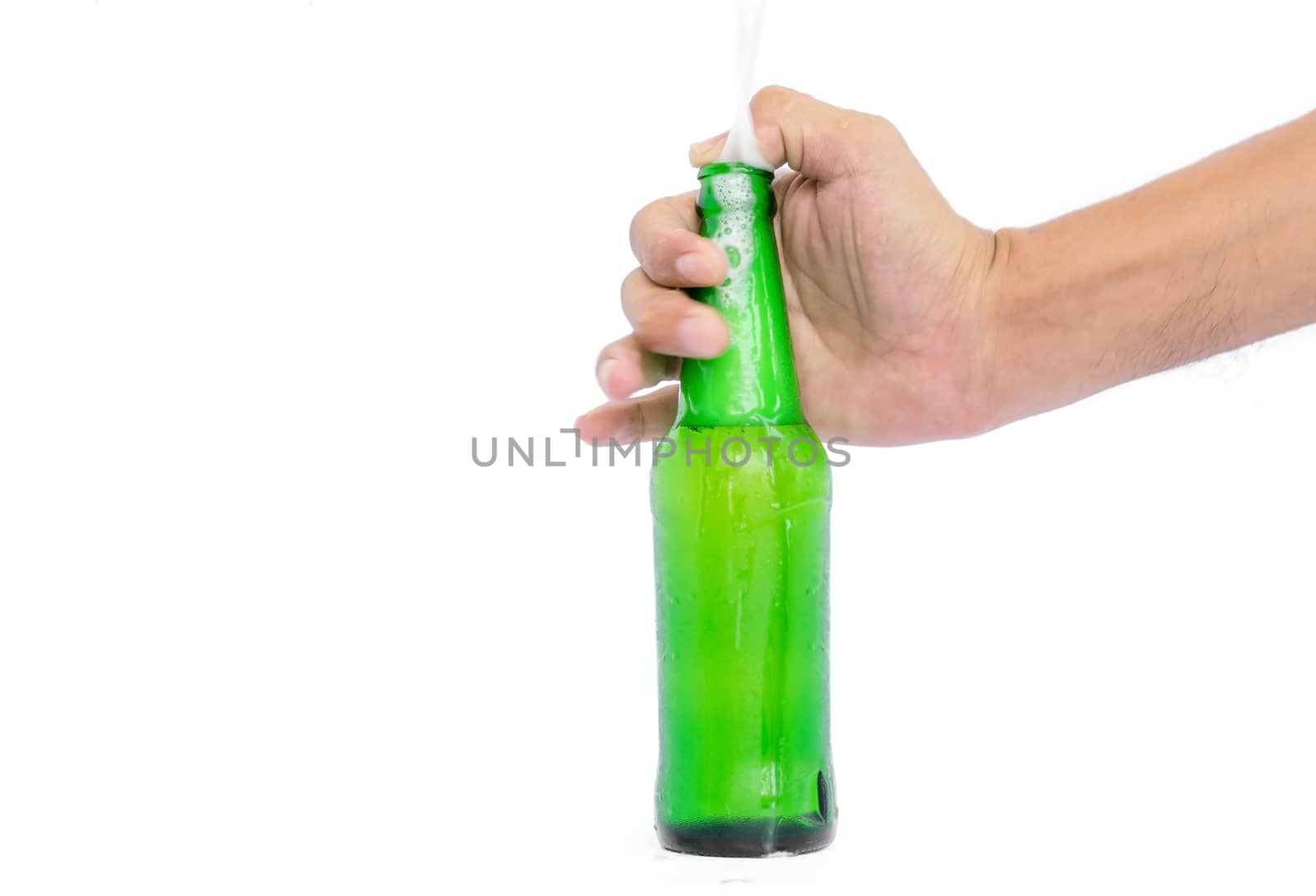 Hand holding the glass bottles for beer. by wattanaphob