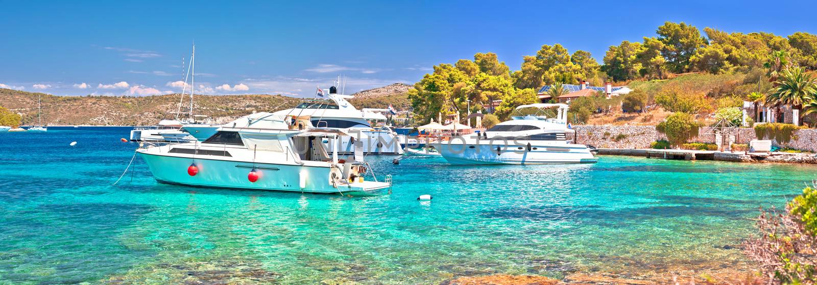 Summer leisure in turquoise bay panoramic view, Pakleni Otoci islands archipelago, Dalmatia region of Croatia