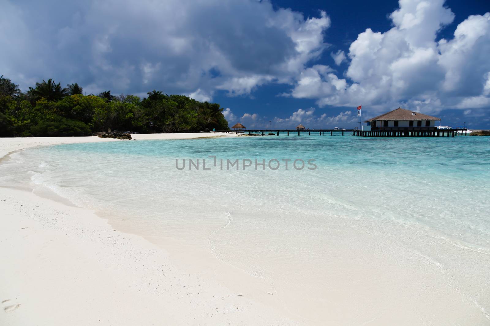 The beach with blue sky and water sport center