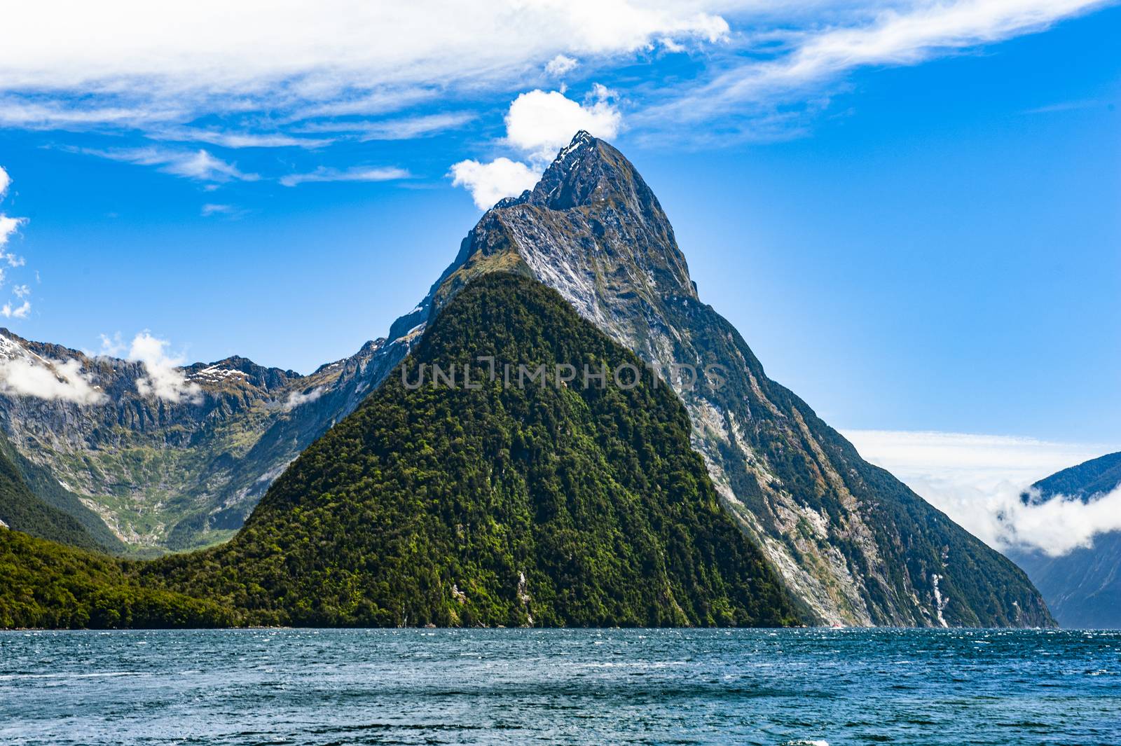 Famous Mitre Peak rising from the Milford Sound fiord. Fiordland national park, New Zealand