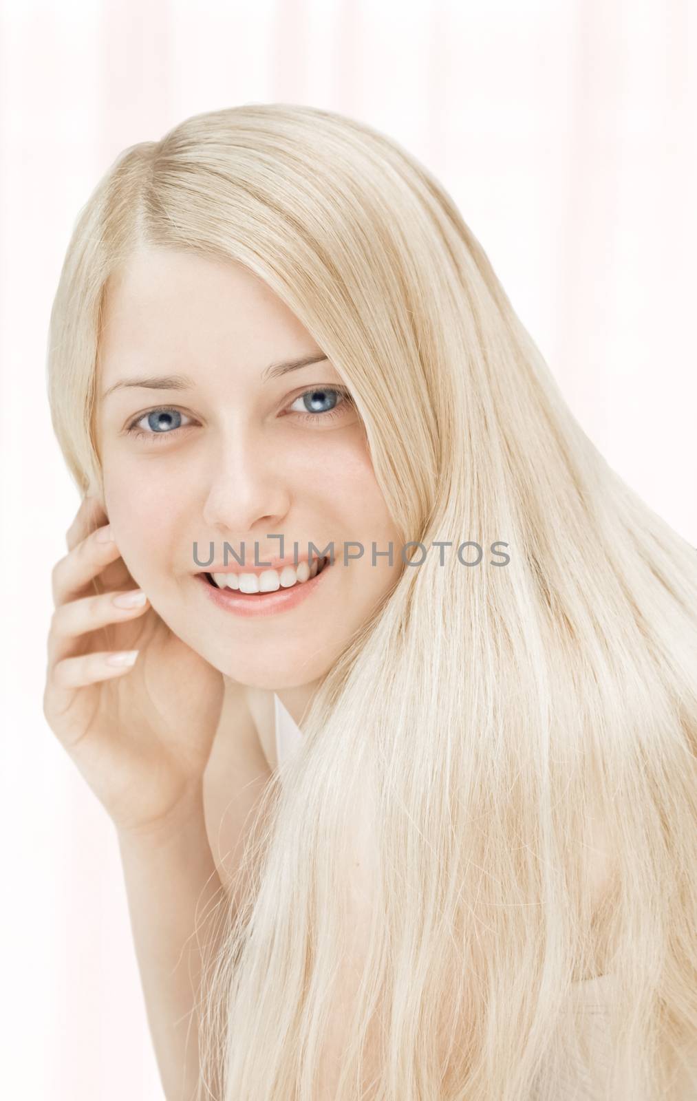 Beauty face close-up of young woman, blonde hair and chic make-up for skincare and haircare brand ads