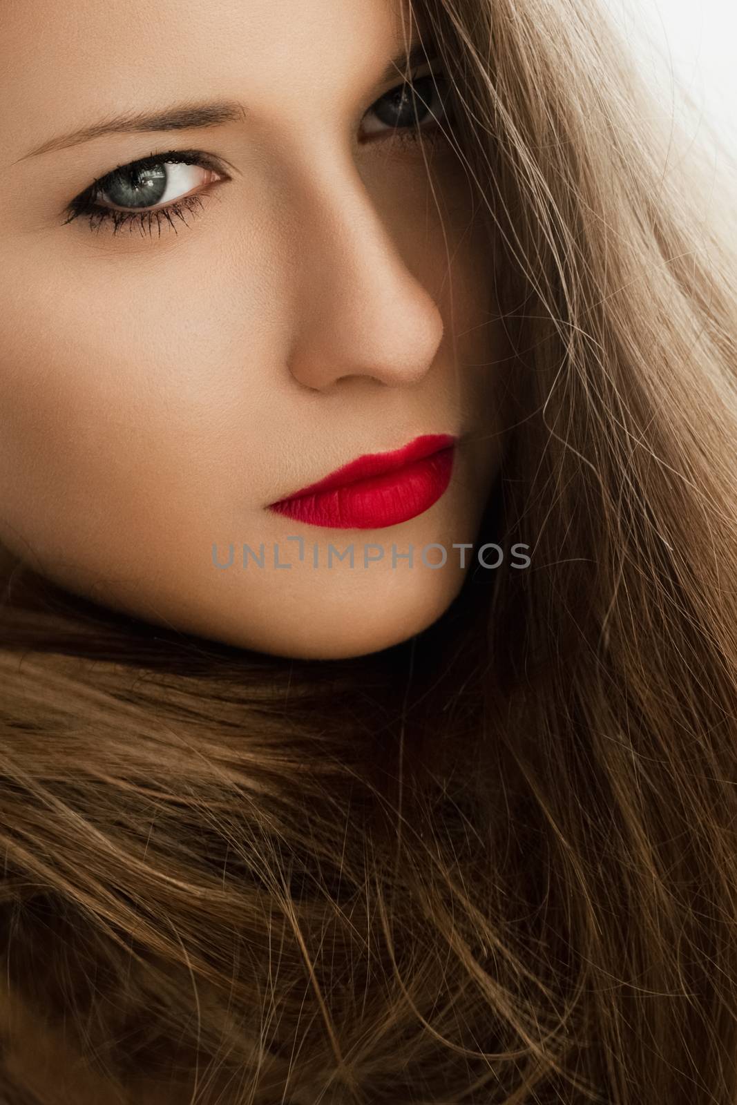 Beauty portrait of a woman with classy makeup look and perfect s by Anneleven