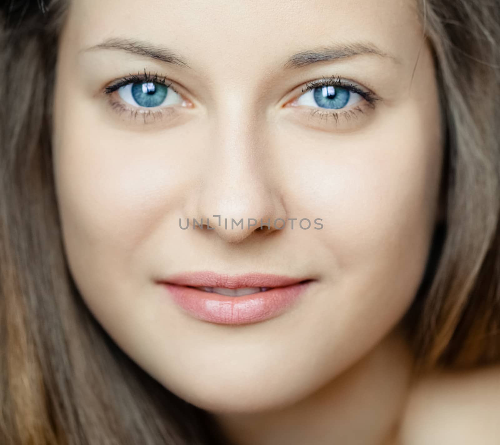 Attractive beauty, closeup face portrait of young woman with lon by Anneleven