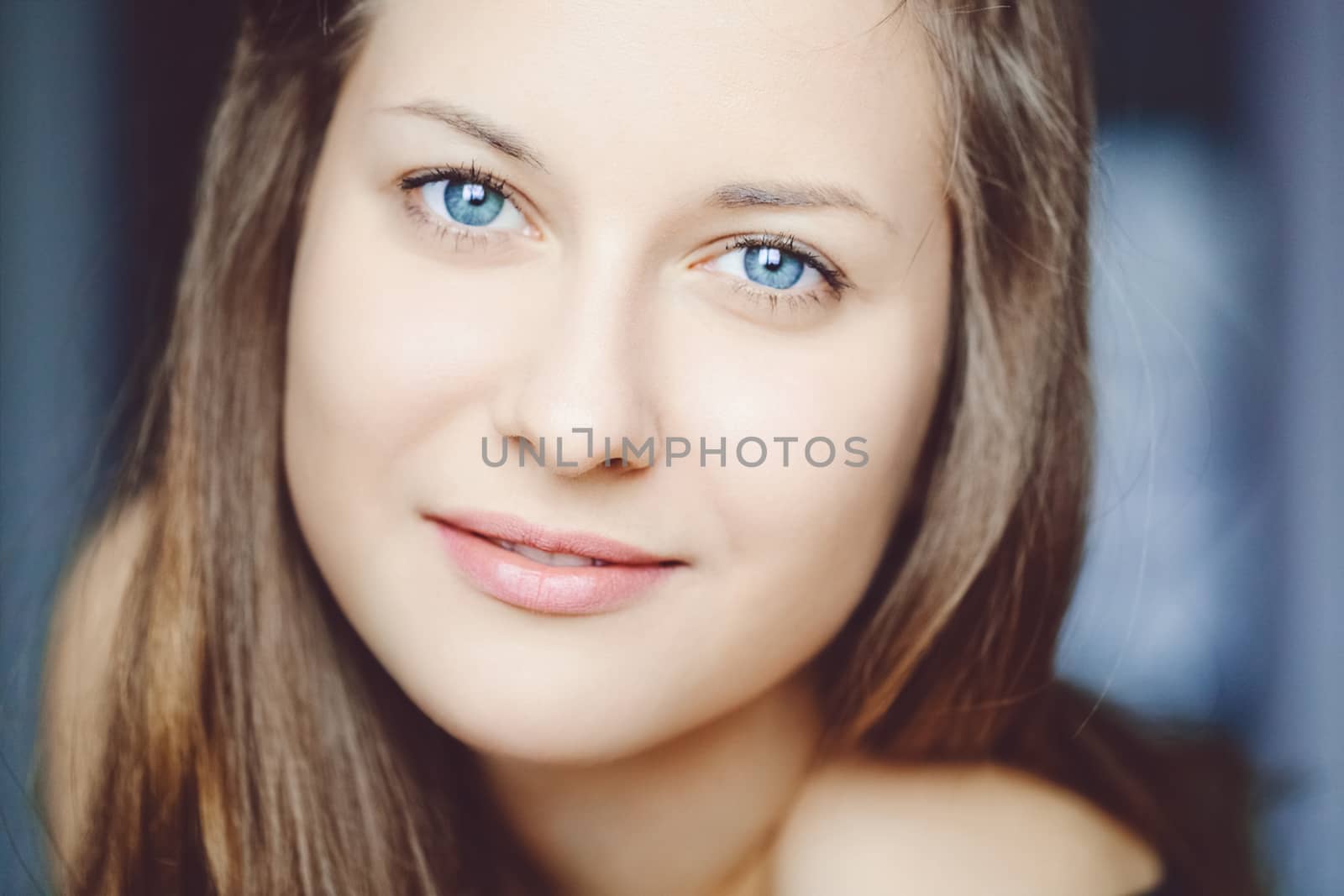 Closeup beauty face portrait of young woman with long hairstyle  by Anneleven