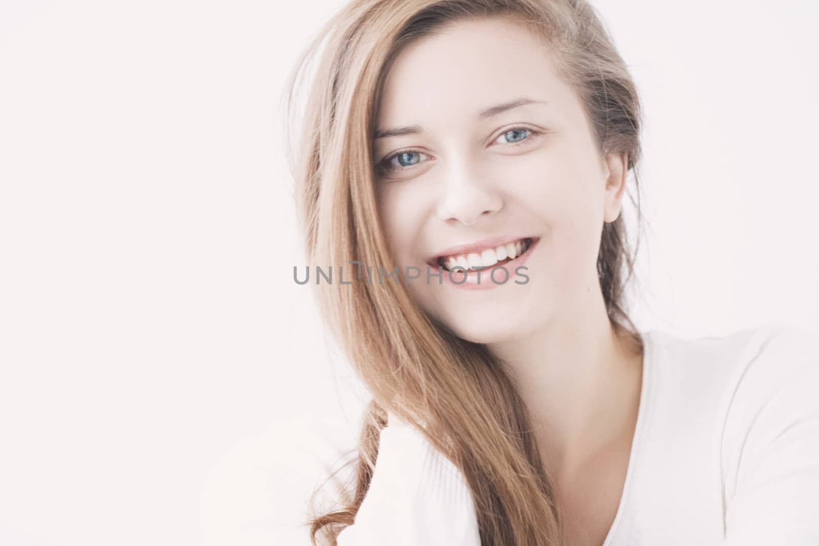 Feminine beauty, closeup face portrait of young woman with long  by Anneleven