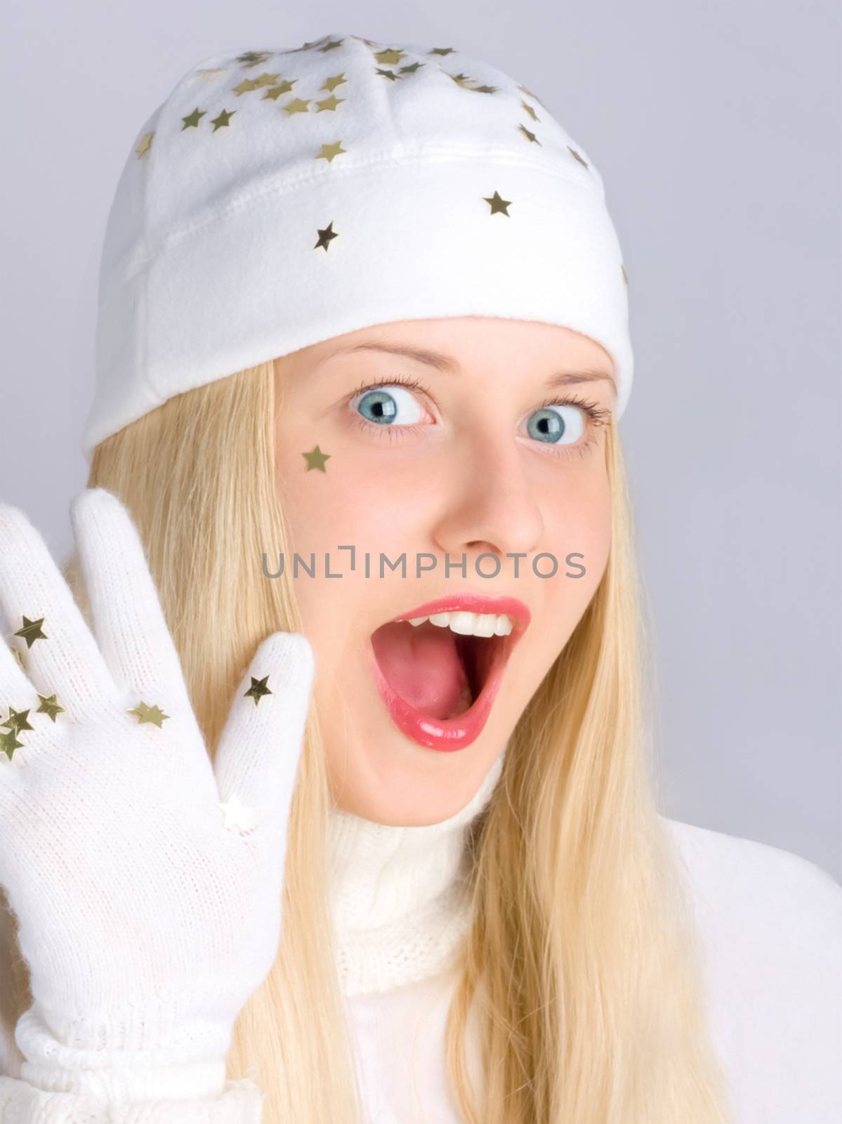 Cheerful blonde girl in Christmas time, woman with positive emotion in winter season for shopping sale and holiday brands