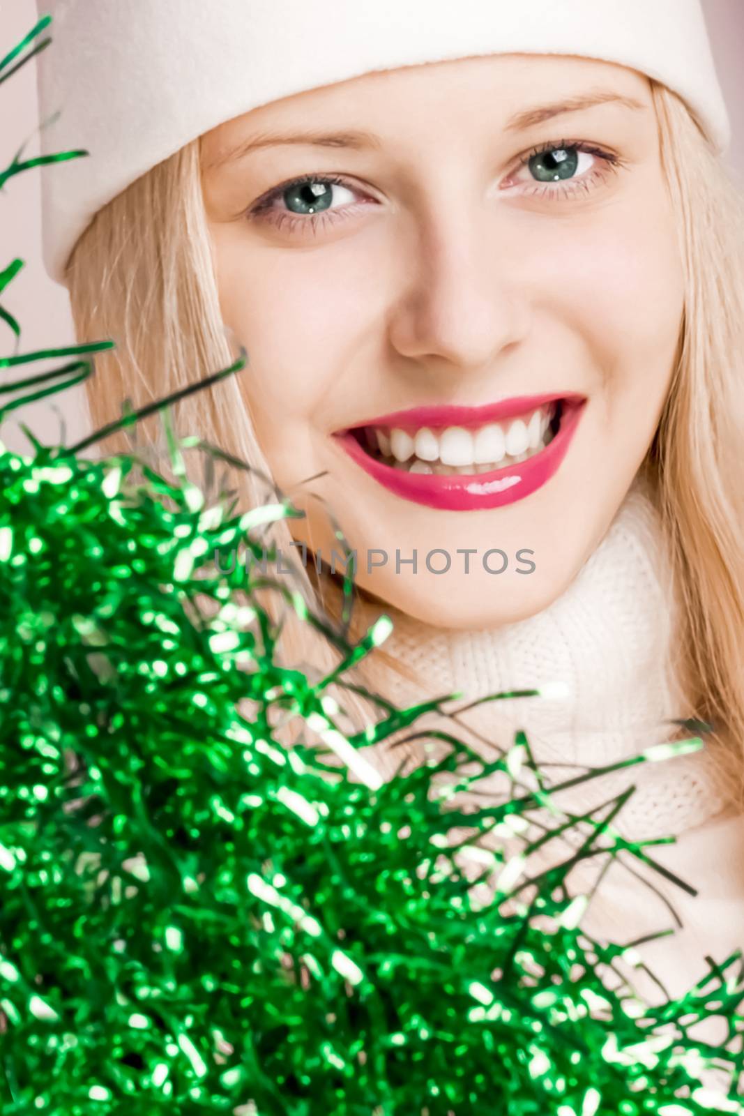 Beautiful blonde girl in Christmas time, woman with positive emotion in winter season for shopping sale and holiday brands