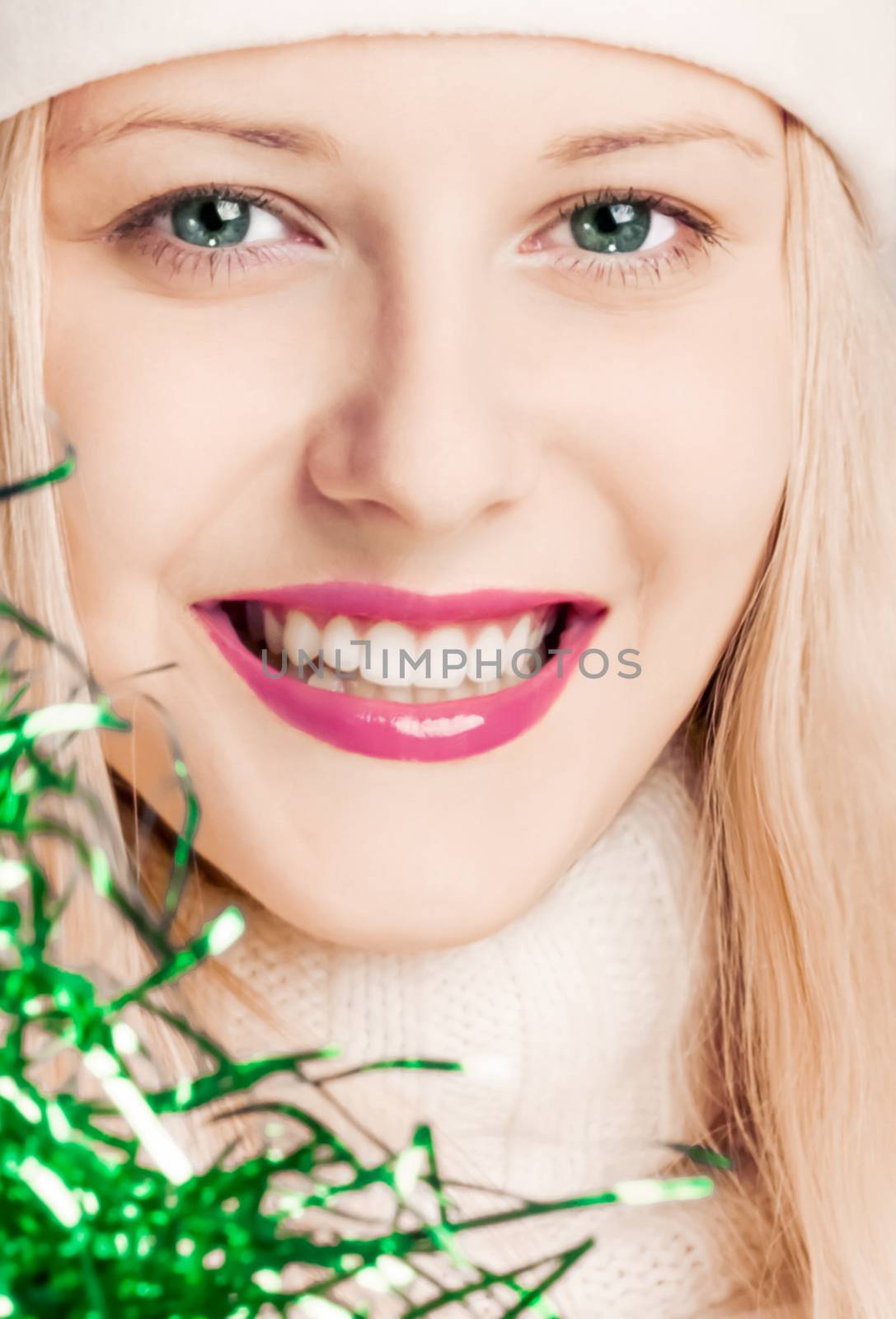Young blonde girl in Christmas time, woman with positive emotion by Anneleven