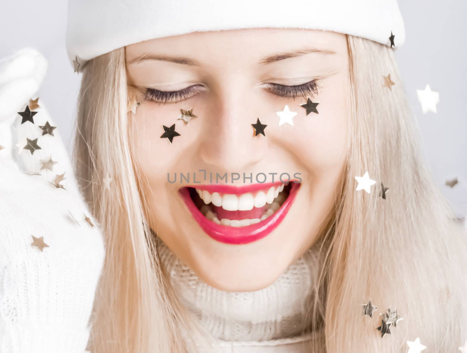Cheerful blonde girl in Christmas time, woman with positive emotion in winter season for shopping sale and holiday brands