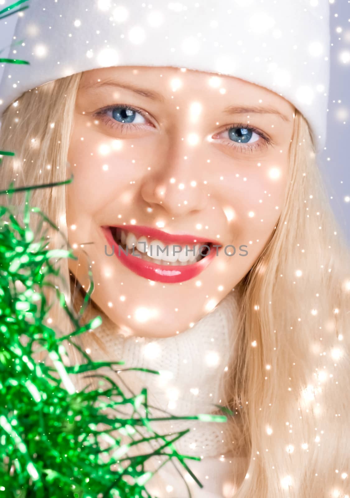 Shiny Christmas and glitter snow background, blonde woman with p by Anneleven