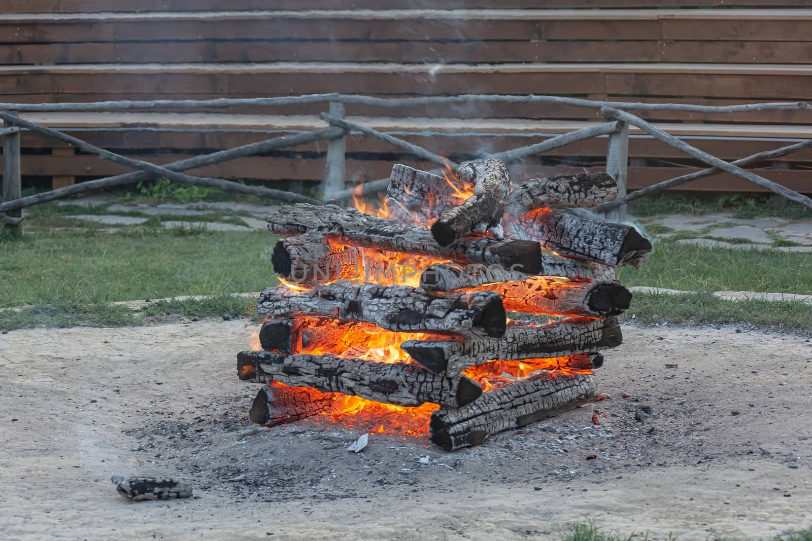 Fire. The burned wood formed coals and a strong heat. Stock photo.
