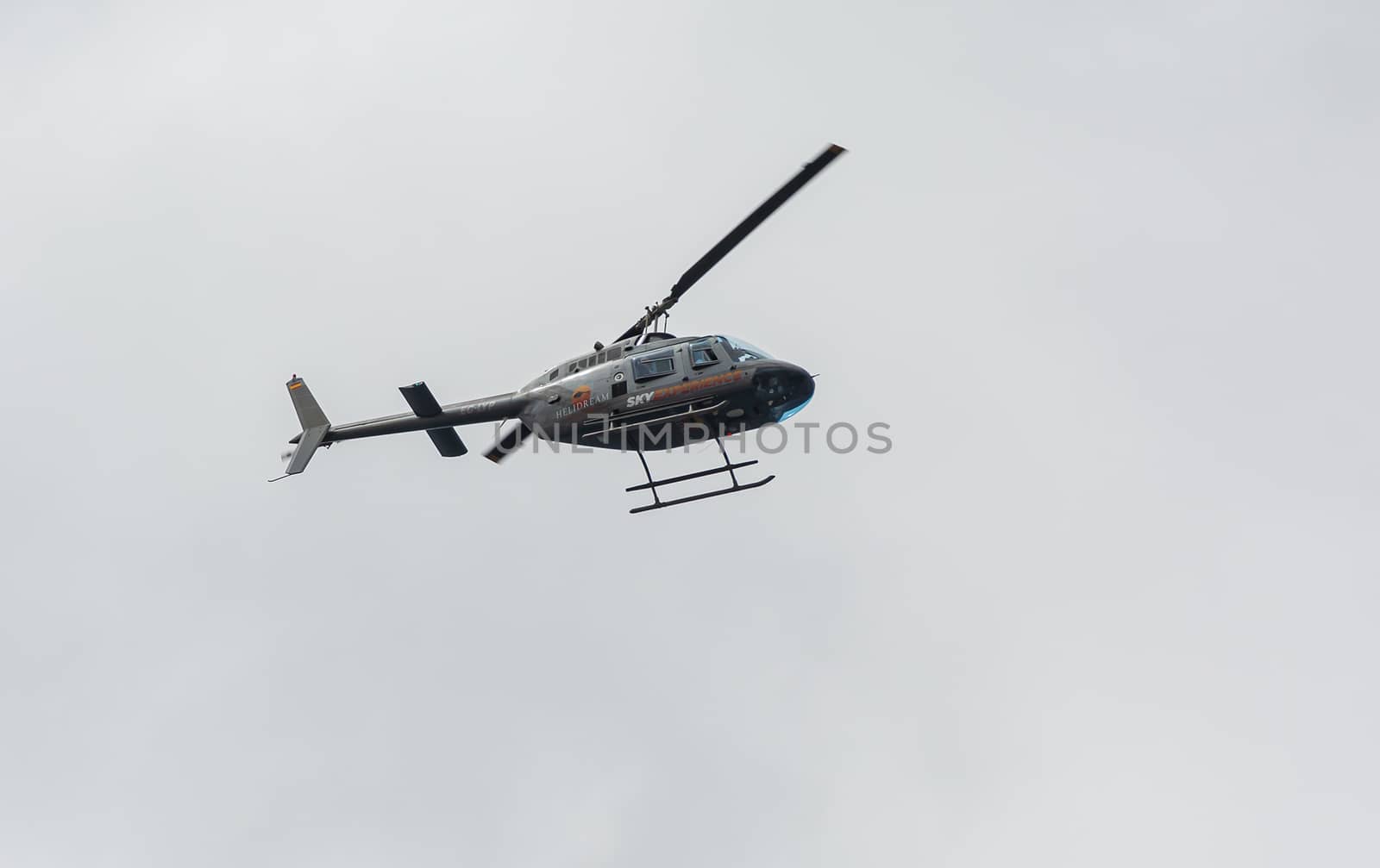 Tenerife, Spain - 05/17/2018: Helicopter in flight. Stock photo
