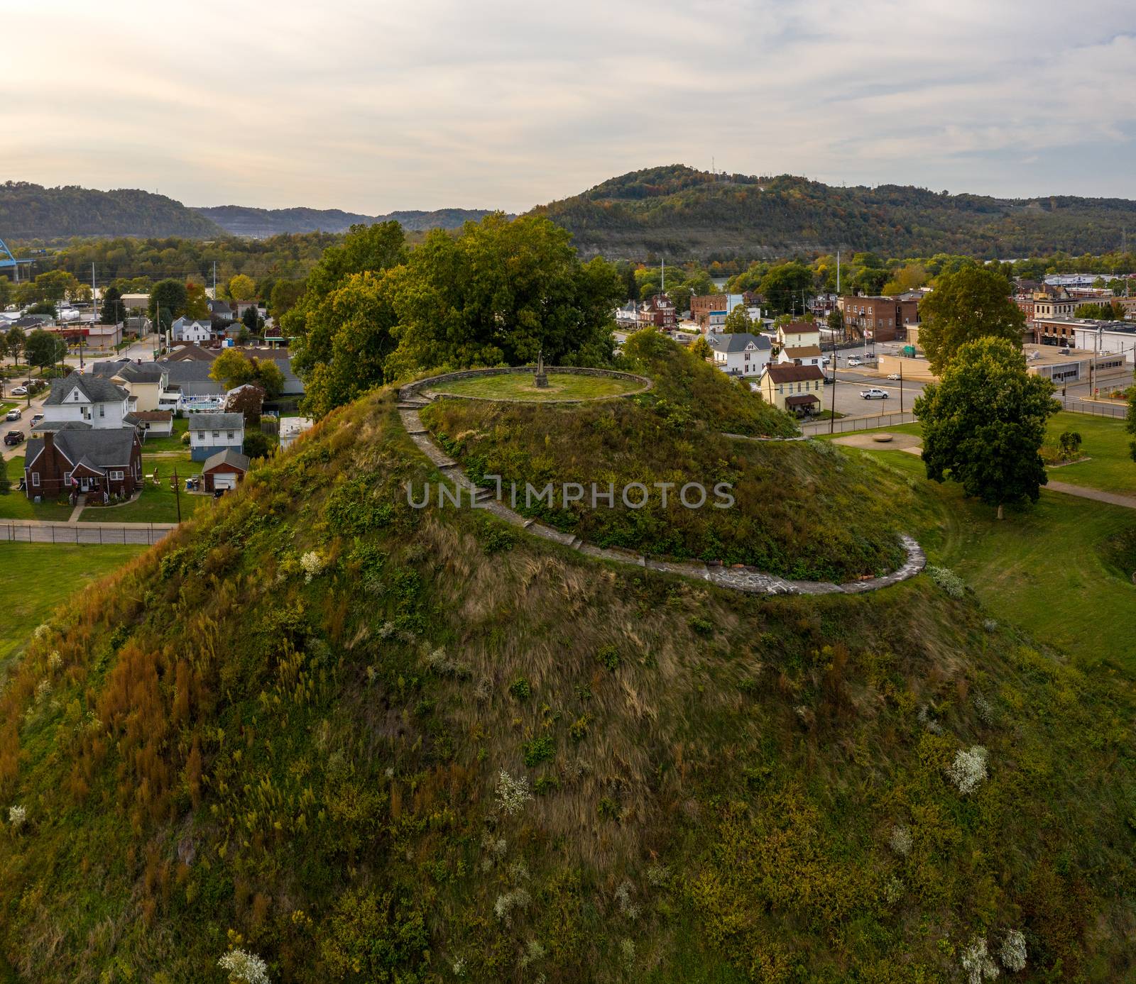 Aerial drone shot of the ancient historic native American burial mound in Moundsville, WV