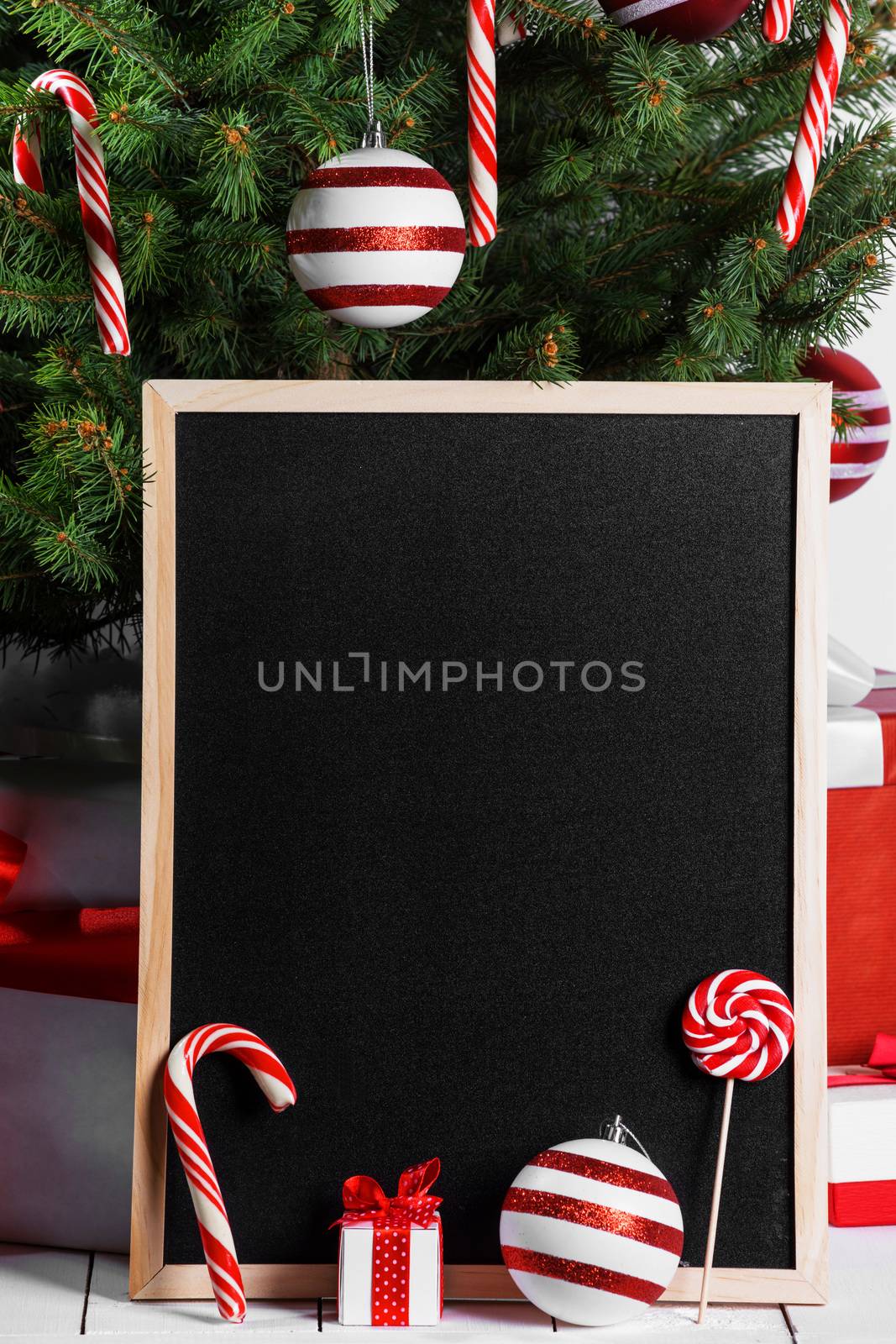 Blank blackboard and Christmas tree by Yellowj