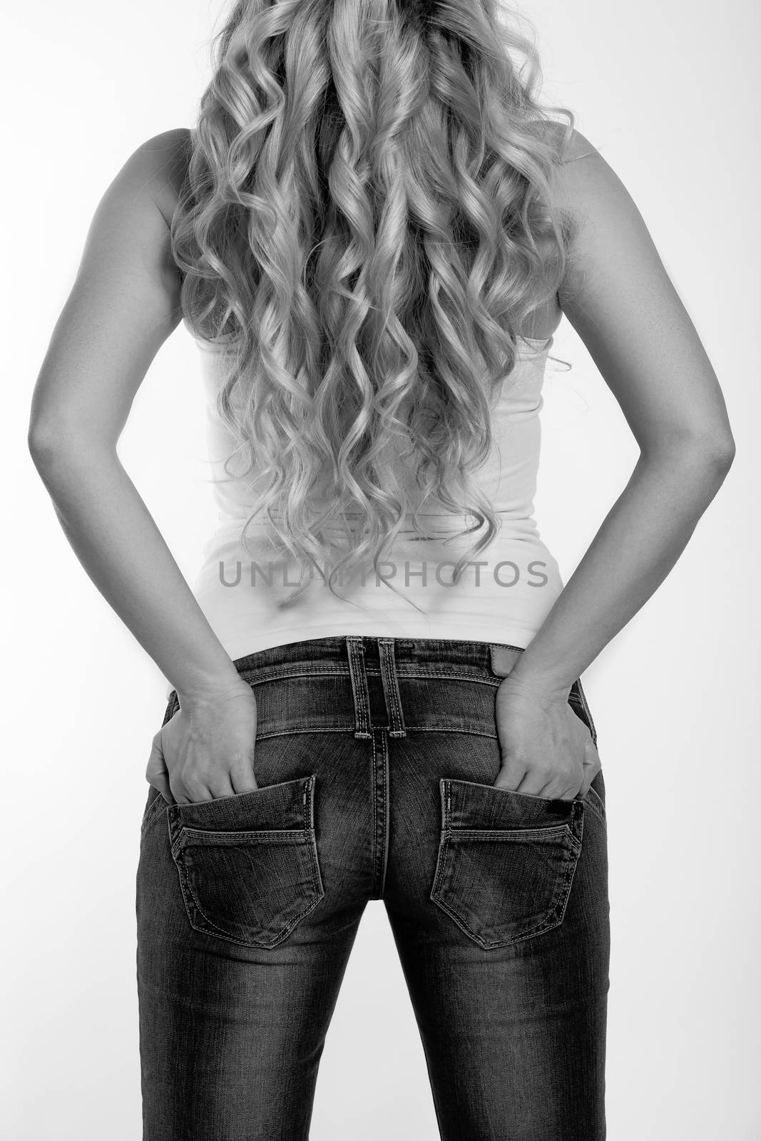 Back view of a woman in blue jeans