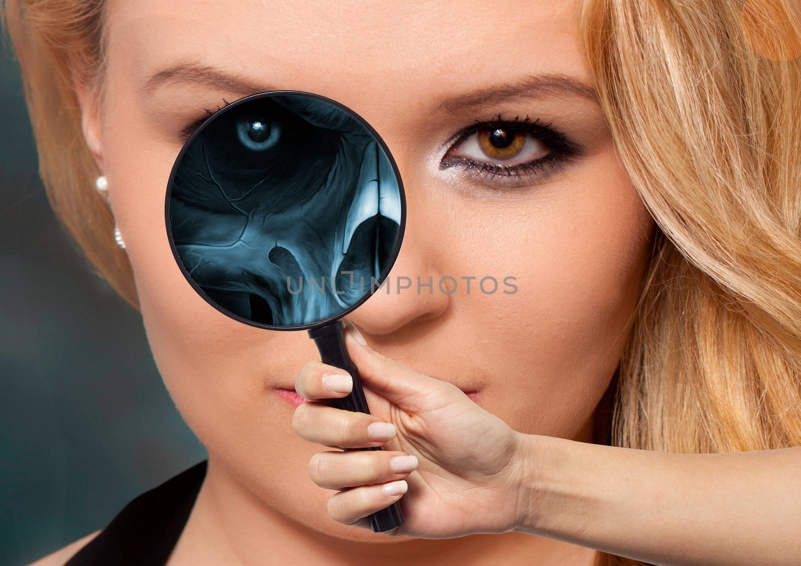 The X-ray with a magnifying glass from the face part of a human, the human eye