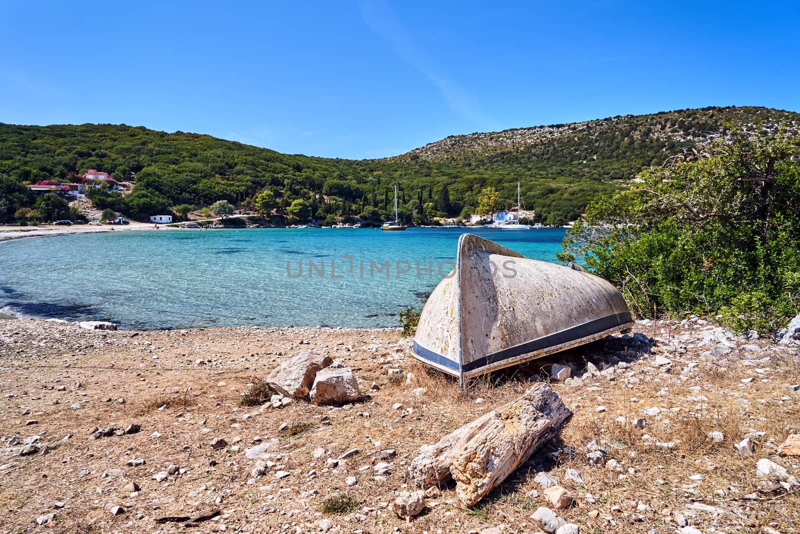 Destroyed boats in a rocky bay on the island of Kefalonia in Greece