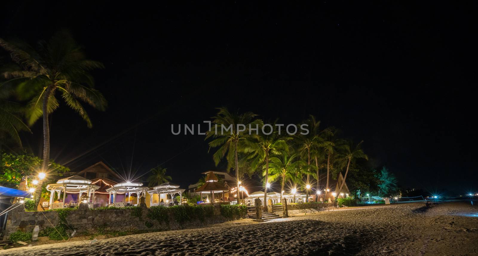 Tropical beach resort in night