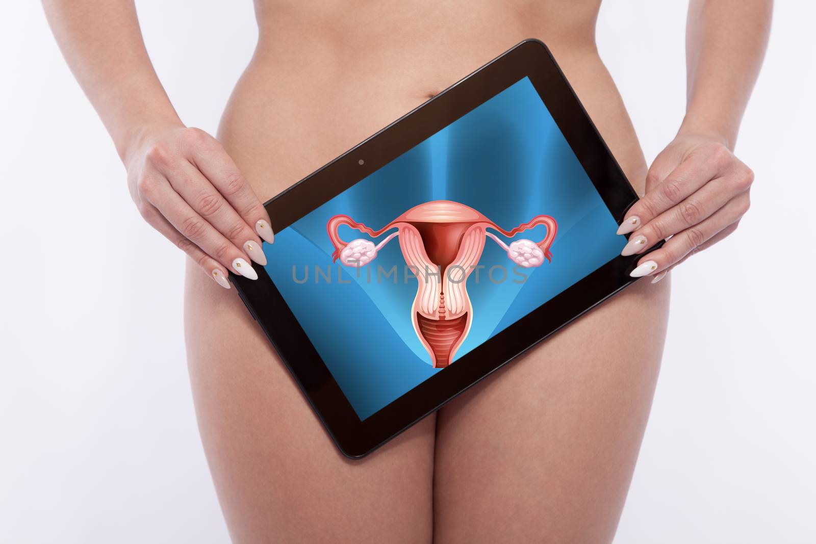 Woman with a tablet screenning her reproductive organs