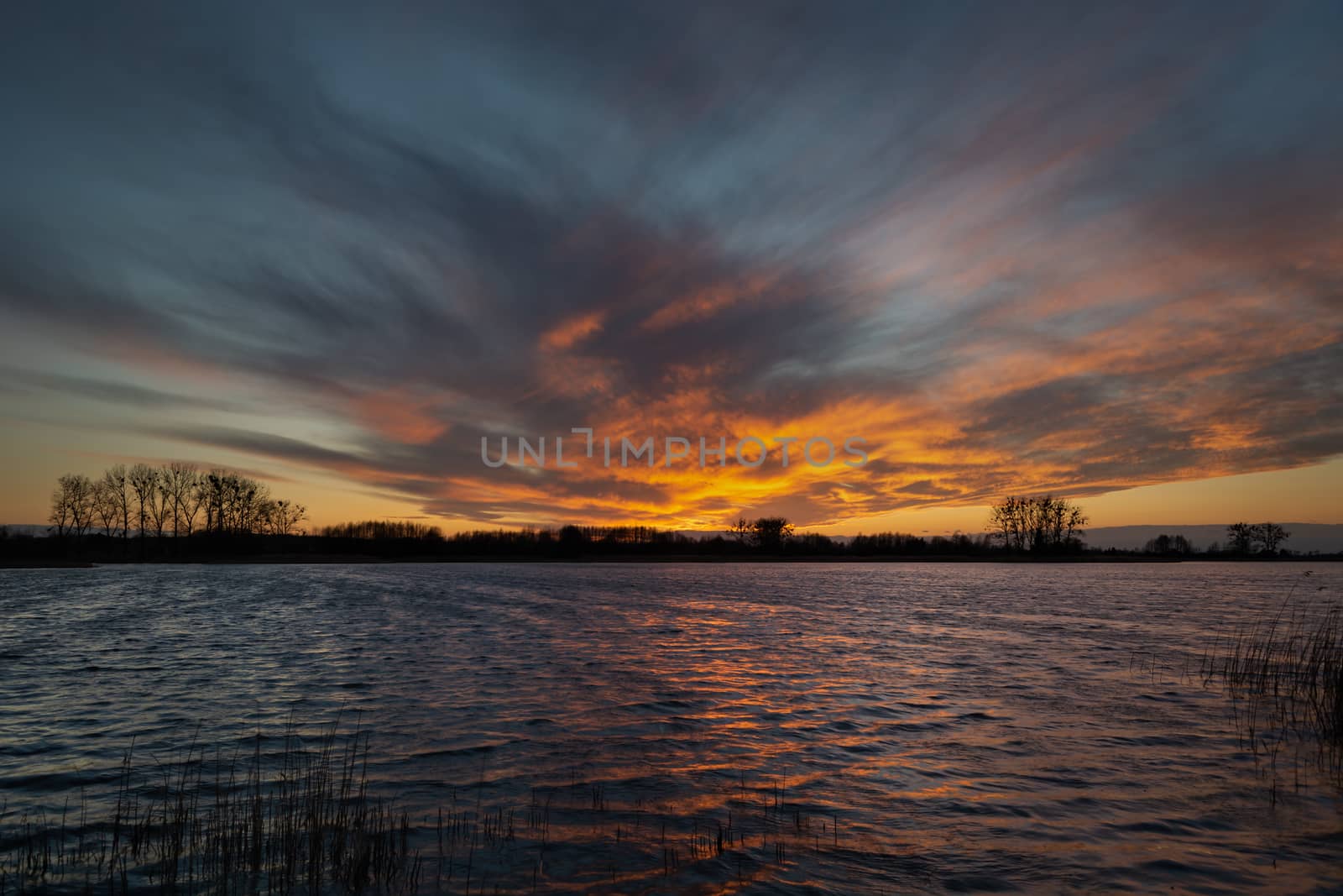 Wonderful sunset on Lake Stankow in Poland, spring evening