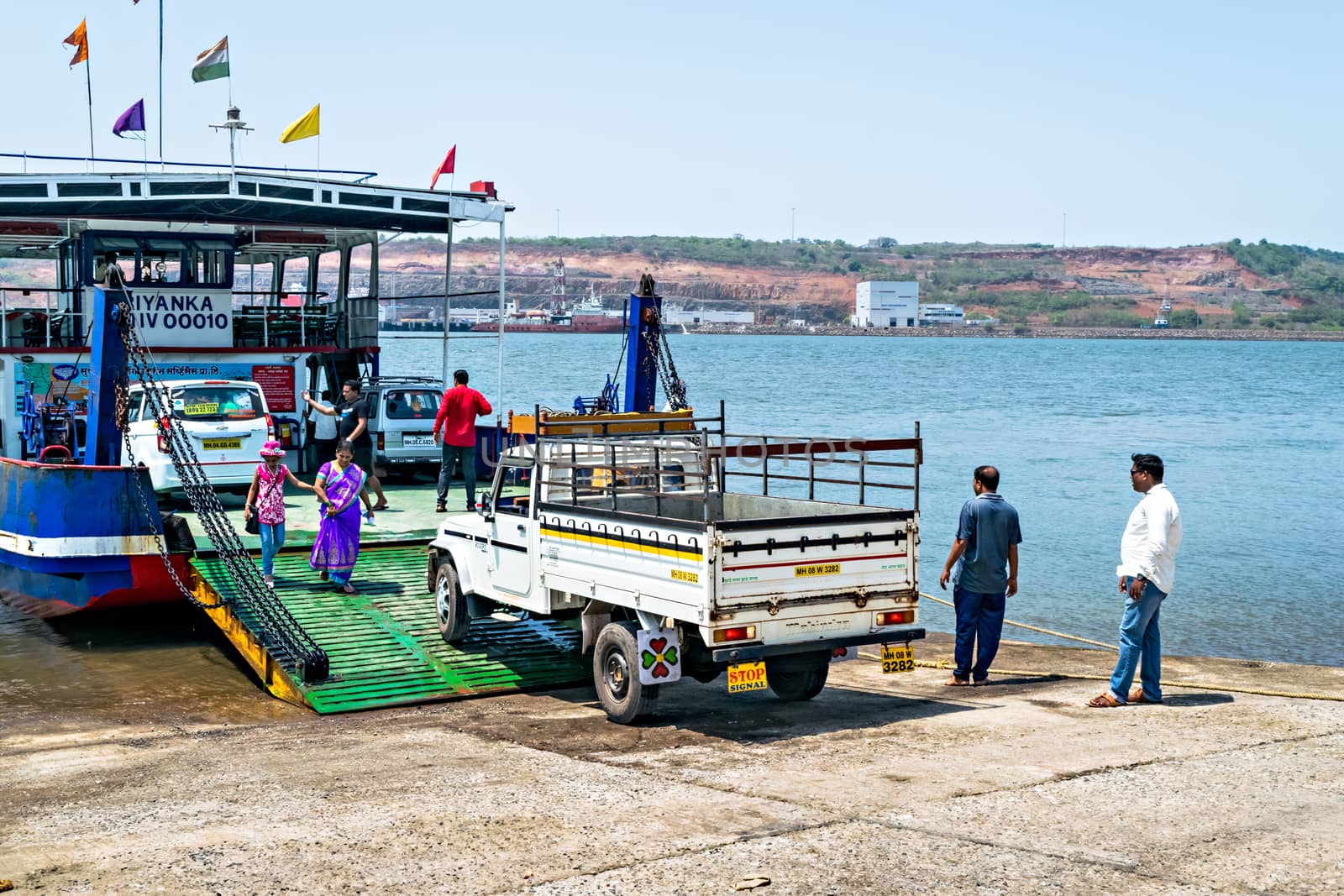 Jaigad,Maharashtra,India-May 2nd,2016:Vehicles being loaded in ferry boat at Jaygad to cross the creek.