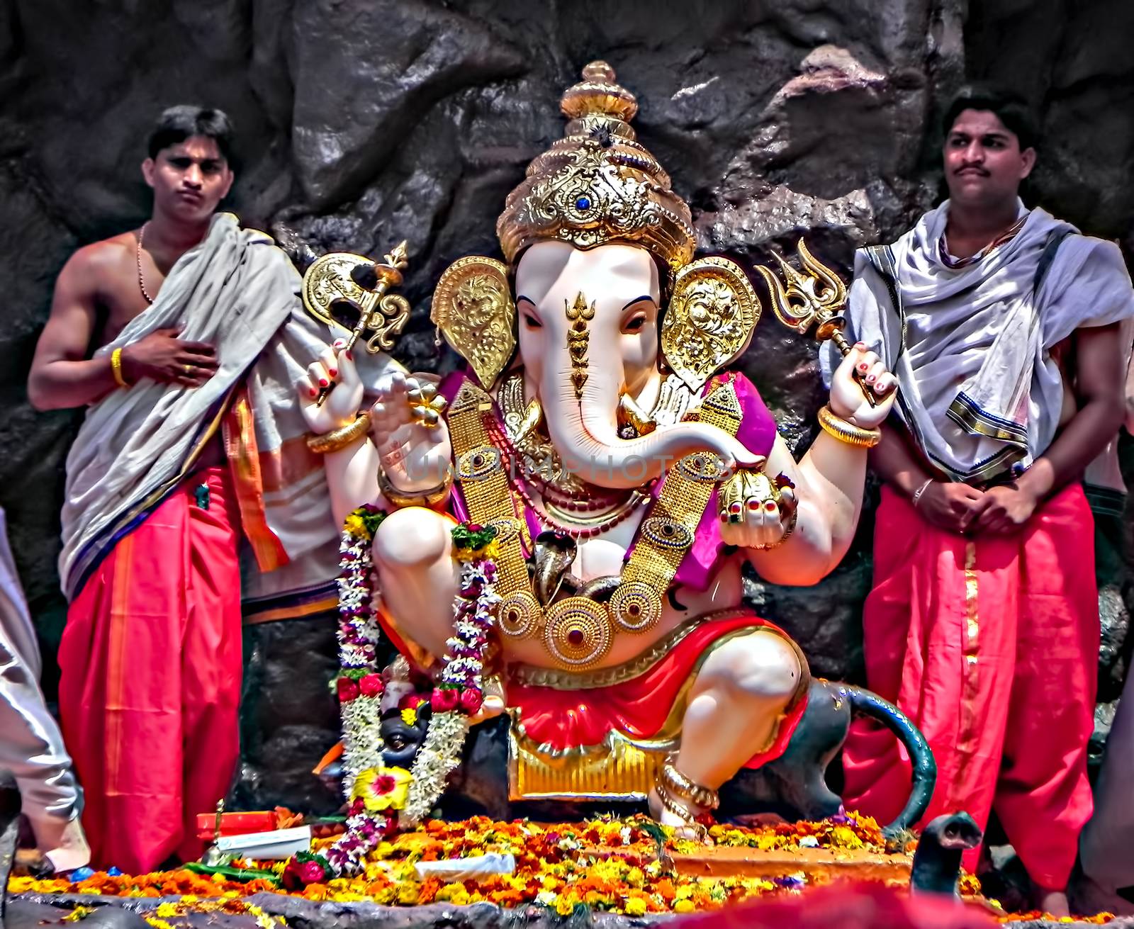 Decorated & garlanded huge idol of Hindu God Ganesha during fest by lalam