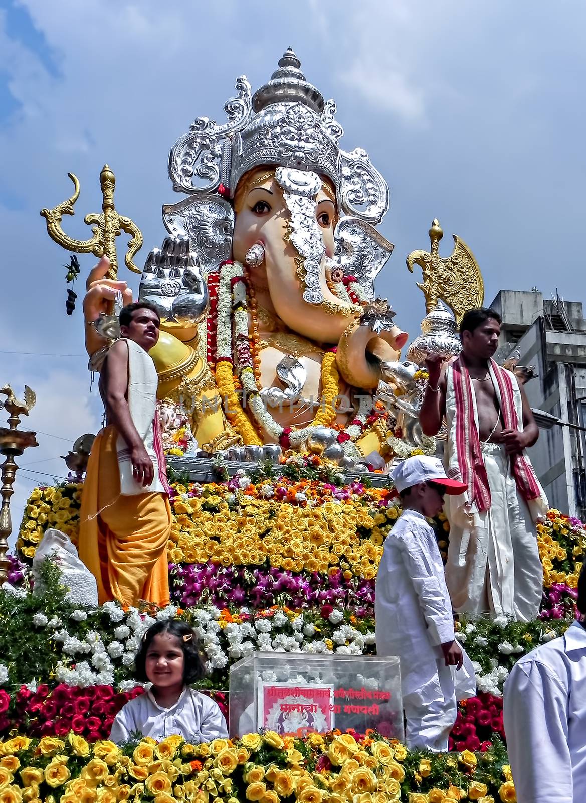 Pune,Maharashtra,India-September 22nd,2010:Decorated and garlanded huge idol of Hindu God Ganesha during festival procession.