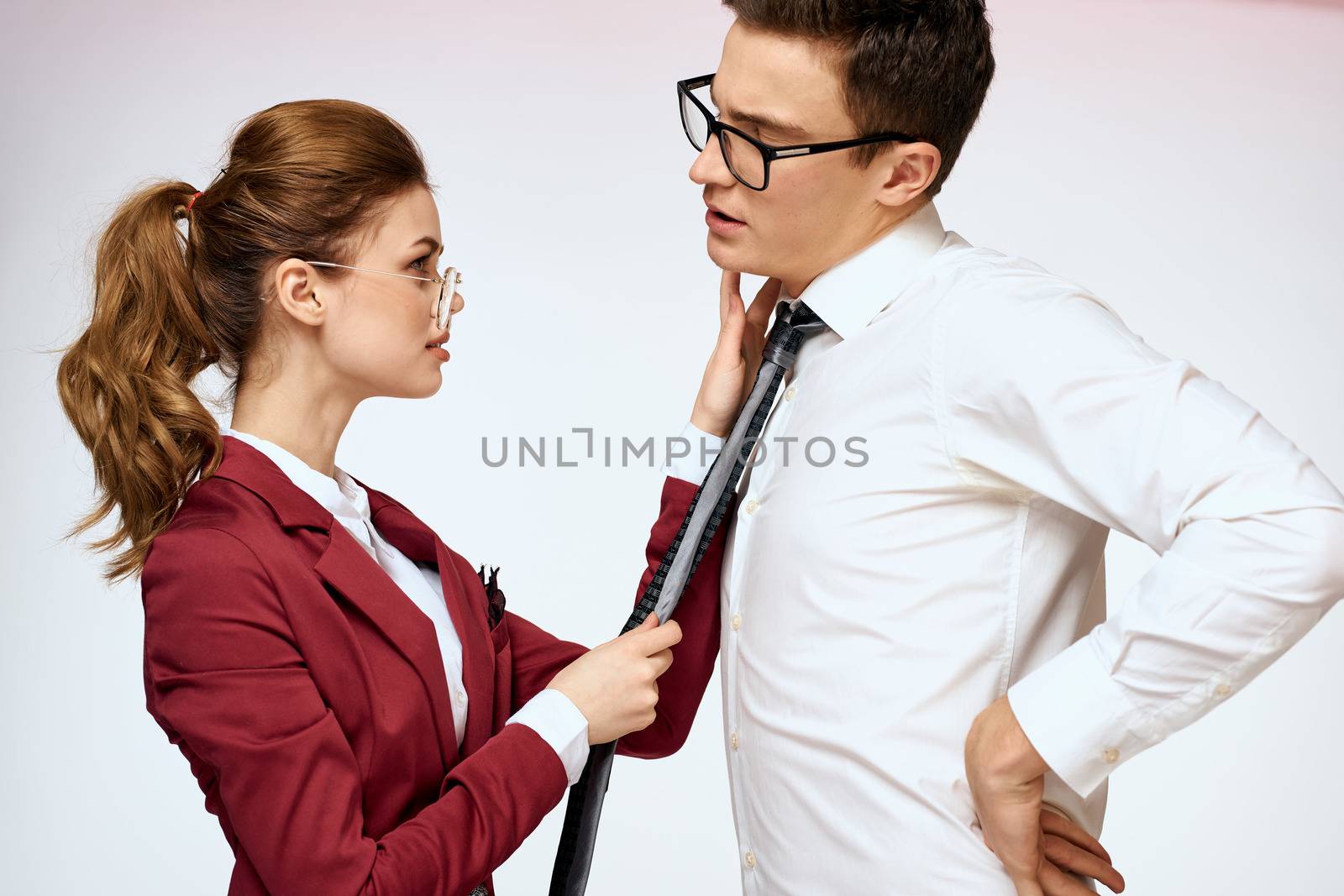 man and woman work colleagues officials communication light background by SHOTPRIME