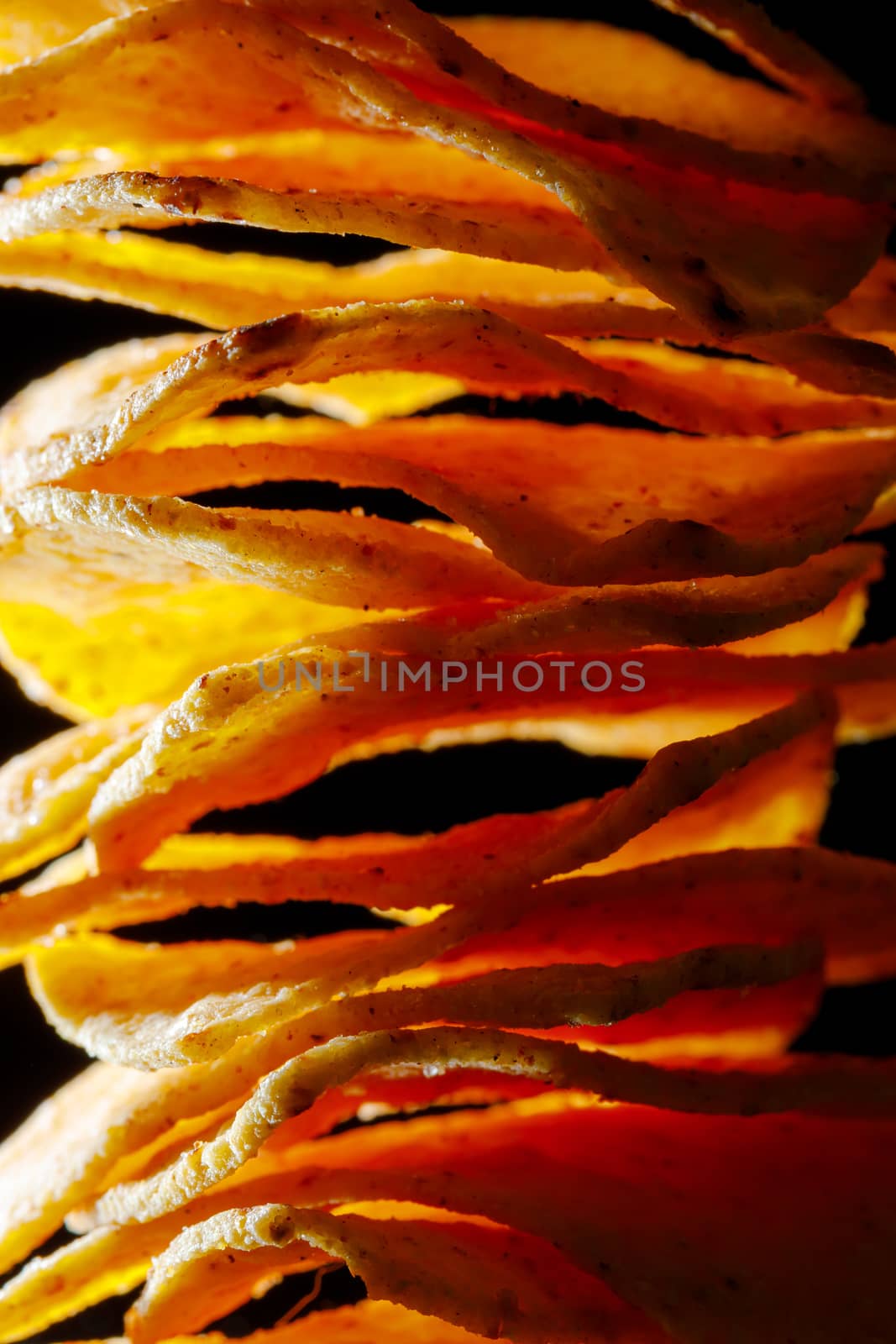 mexican nachos tortilla chips stack, close-up view by nikkytok