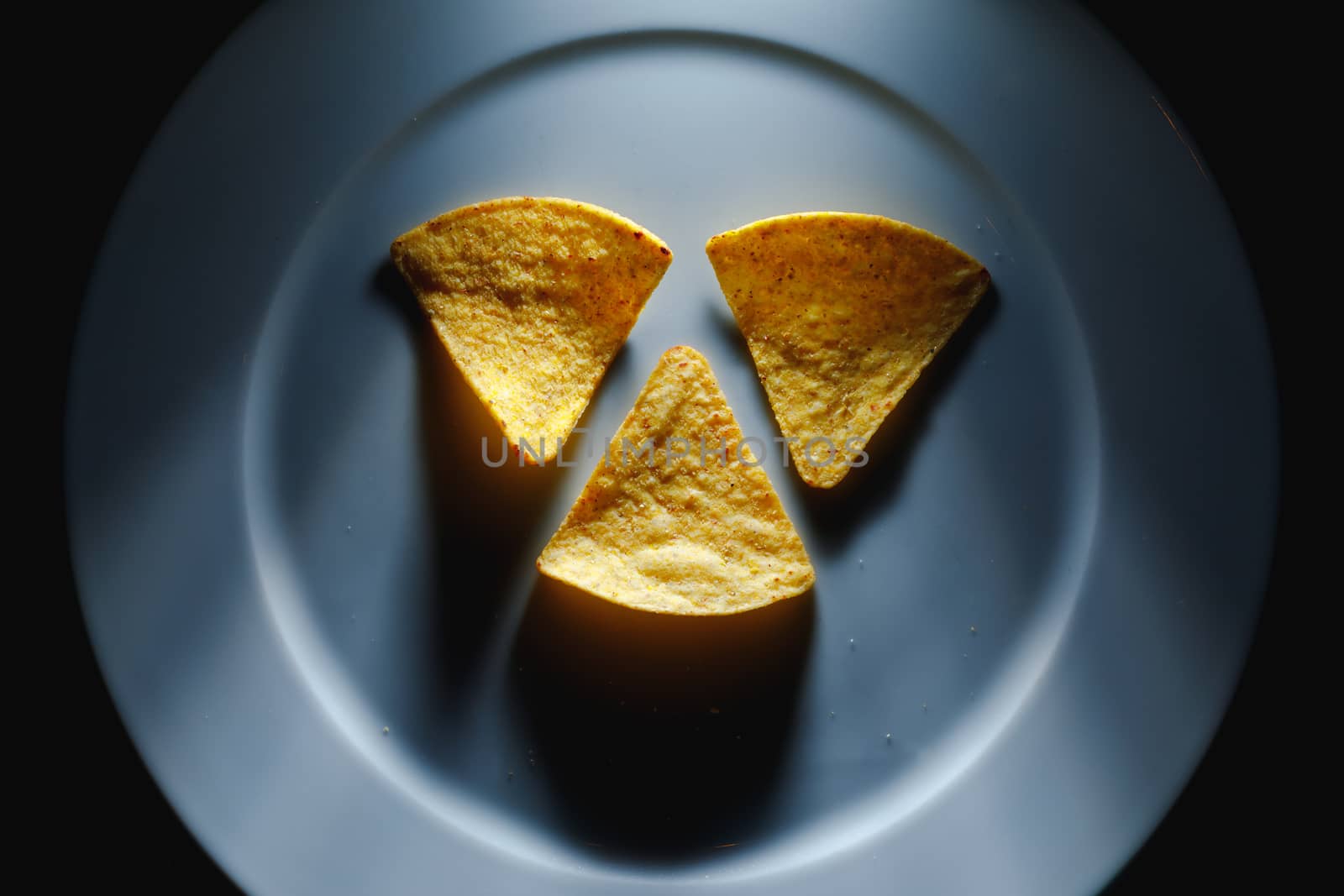 mexican nachos tortilla chips on plate, close-up view