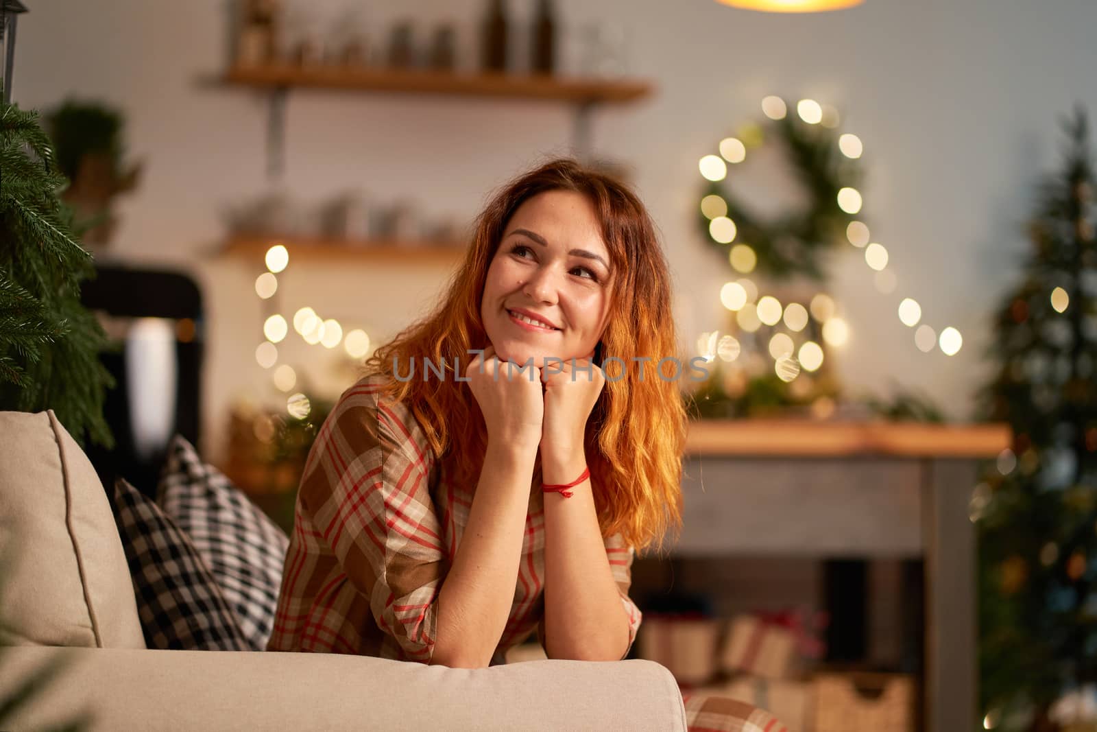 A lovely redhead girl with a mysterious smile makes plans for the new year.