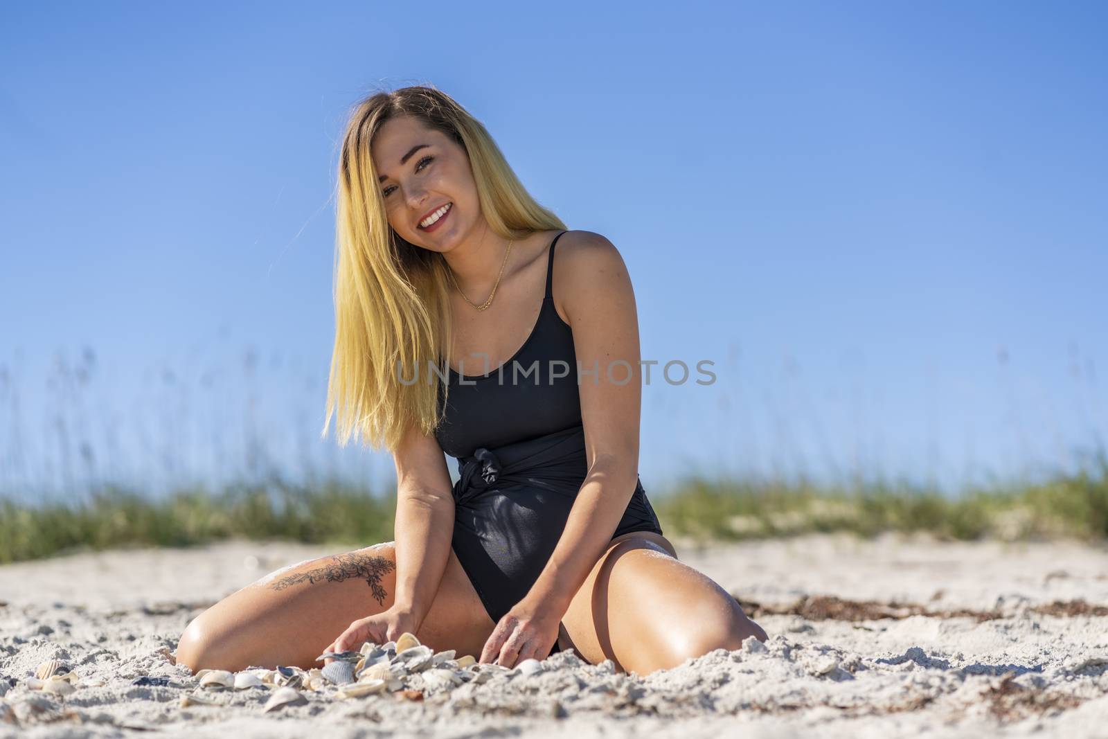 Beautiful Bikini Model Posing In A Beach Environment by actionsports