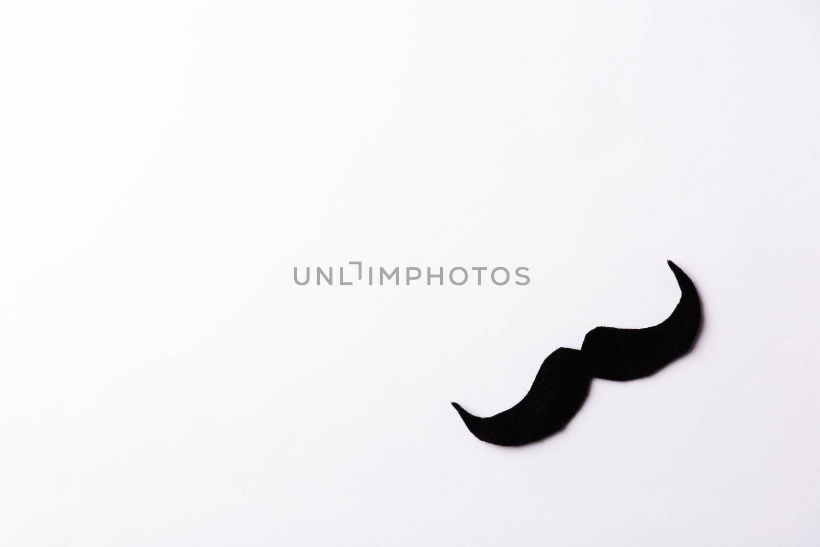Black mustache, studio shot isolated on white background, Prostate cancer awareness month, Fathers day, minimal November moustache concept