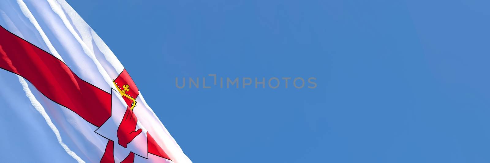 3D rendering of the national flag of Northern Ireland waving in the wind against a blue sky