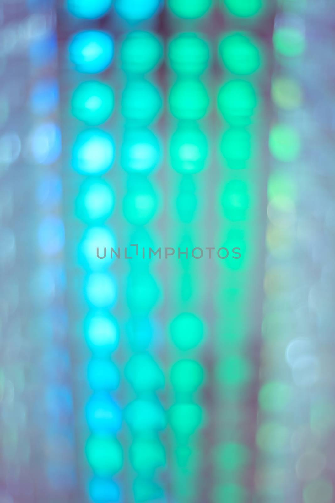 abstract defocused background of stadium or discotheque lights, colorful bokeh of lighting decoration