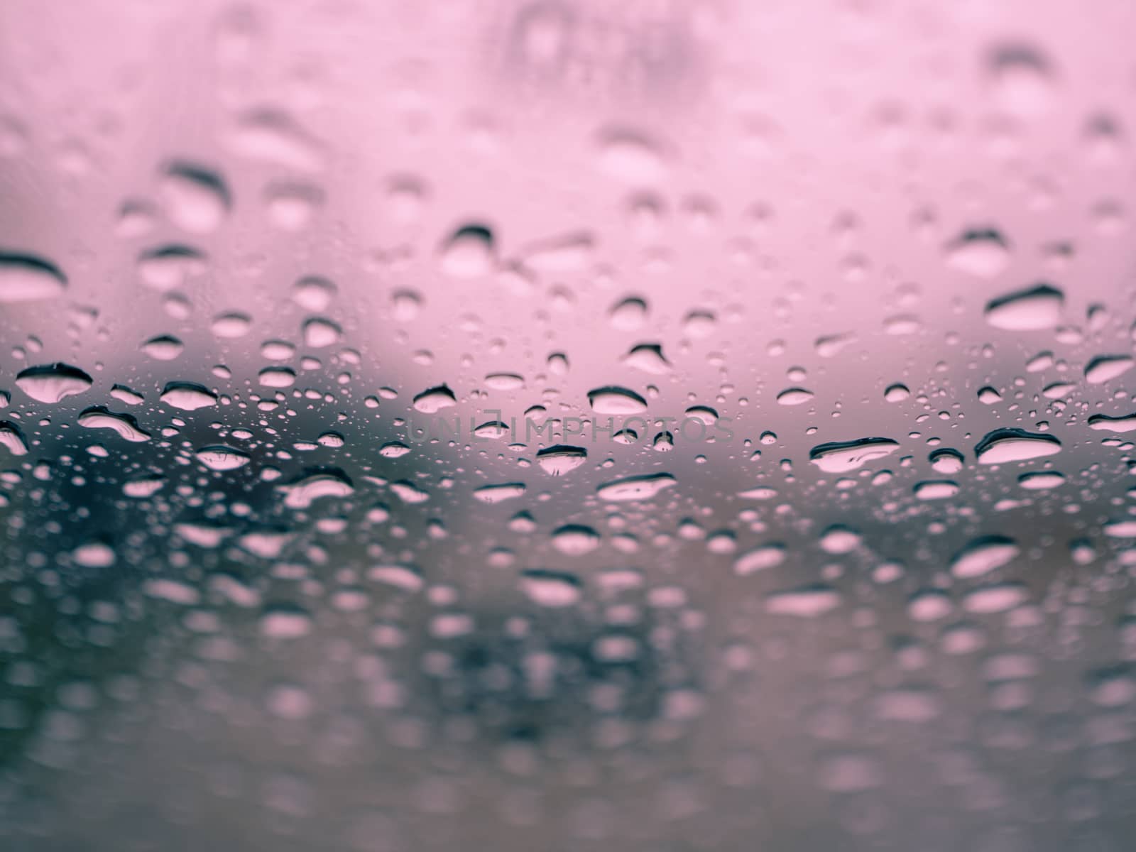 Rain drops on the glass during the heavy rains in the rainy seas by Unimages2527