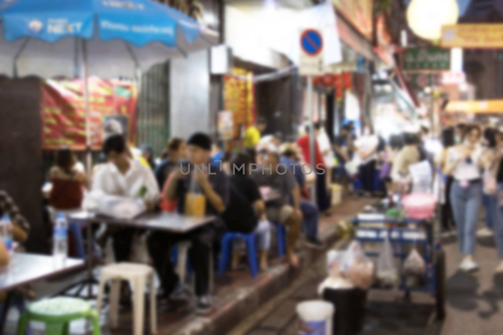 blurred image Street food in Chinatown Bangkok Thailand and people high concentration of them in busy areas